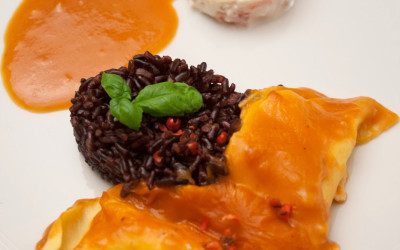 Ravioli van langoustine met zwarte rijst